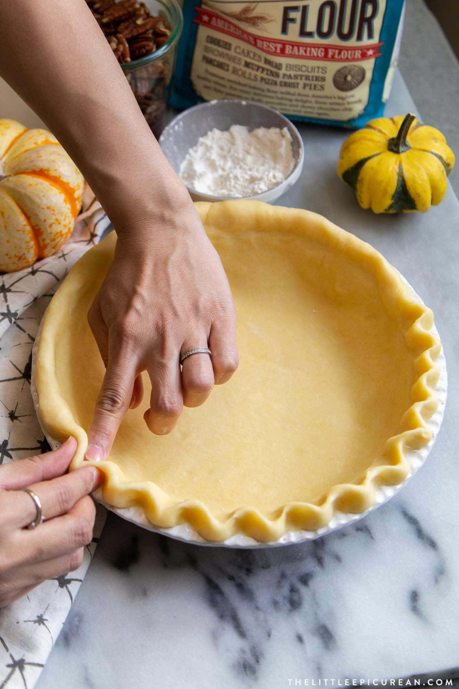 Learn how to make an all-butter pie dough. This easy and forgiving pie dough is a staple during holiday pie season! #pie #pieseason #holidaypies #allbutterpiedough #piedough