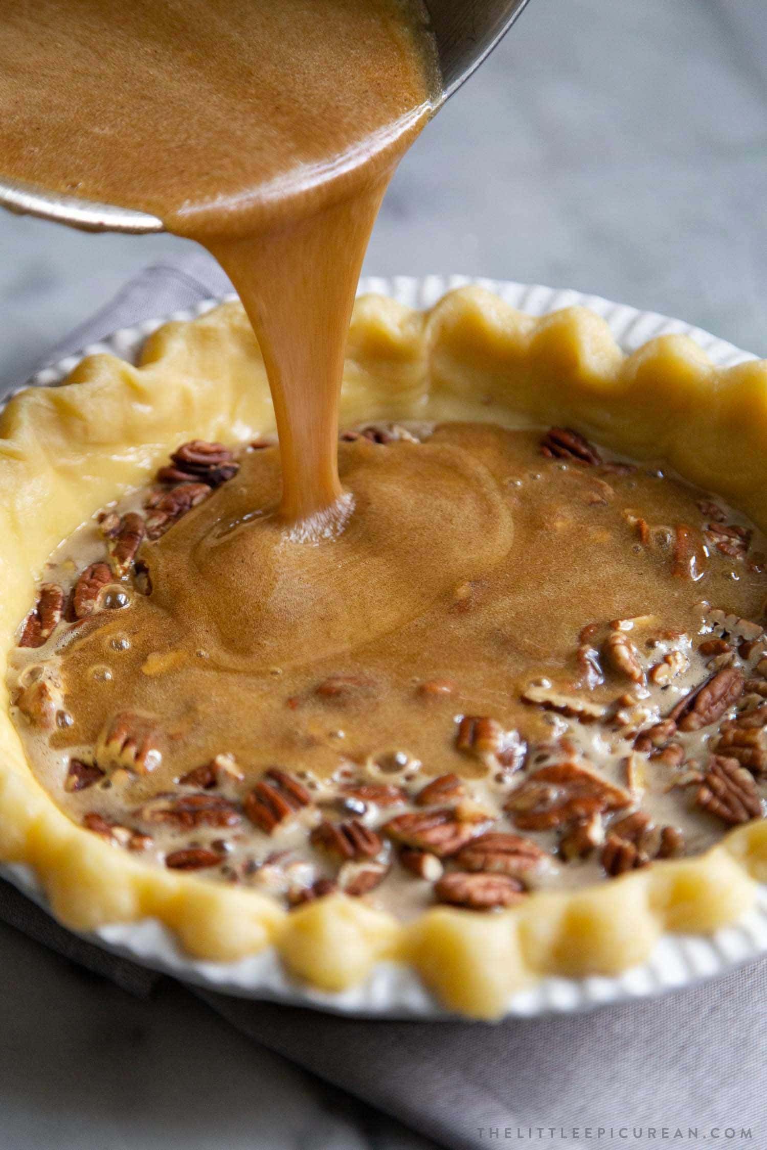 Brown Butter Pecan Pie. Traditional pecan pie with the added warmth and nuttiness of brown butter. This recipe includes a homemade butter pie crust. Perfect for Thanksgiving and beyond! #pecanpie #pie #classicpie #recipe #thanksgiving #holidays #fallbaking