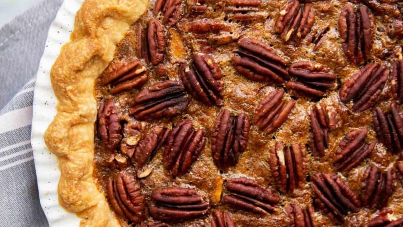 Brown Butter Pecan Pie. Traditional pecan pie with the added warmth and nuttiness of brown butter. This recipe includes a homemade butter pie crust. Perfect for Thanksgiving and beyond! #pecanpie #pie #classicpie #recipe #thanksgiving #holidays #fallbaking