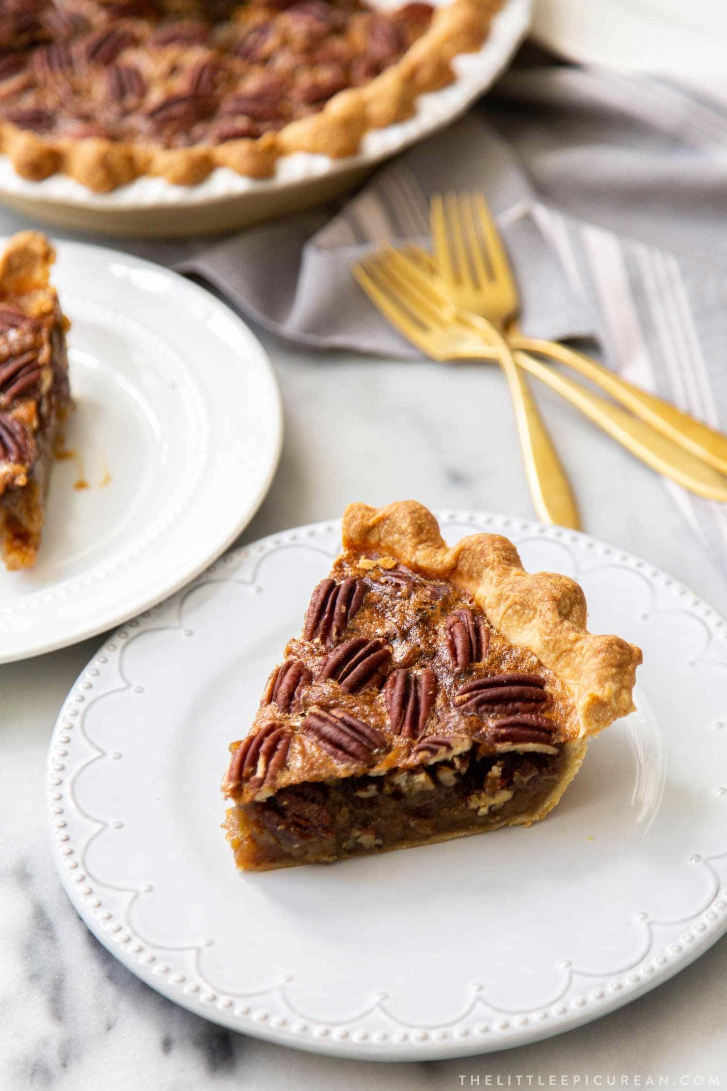 Brown Butter Pecan Pie. Traditional pecan pie with the added warmth and nuttiness of brown butter. This recipe includes a homemade butter pie crust. Perfect for Thanksgiving and beyond! #pecanpie #pie #classicpie #recipe #thanksgiving #holidays #fallbaking