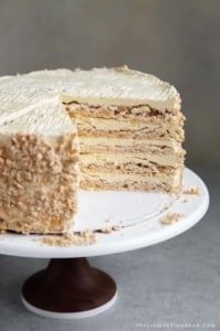 Interior shot of Sans Rival Cake. Filipino cake consisting of cashew dacquoise layered with French buttercream. #cake #dessert #glutenfree #cashews #buttercream #filipino #filipinodesserts #filipinorecipes