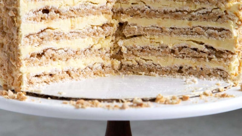 Interior shot of Sans Rival Cake. Filipino cake consisting of cashew dacquoise layered with French buttercream. #cake #dessert #glutenfree #cashews #buttercream #filipino #filipinodesserts #filipinorecipes