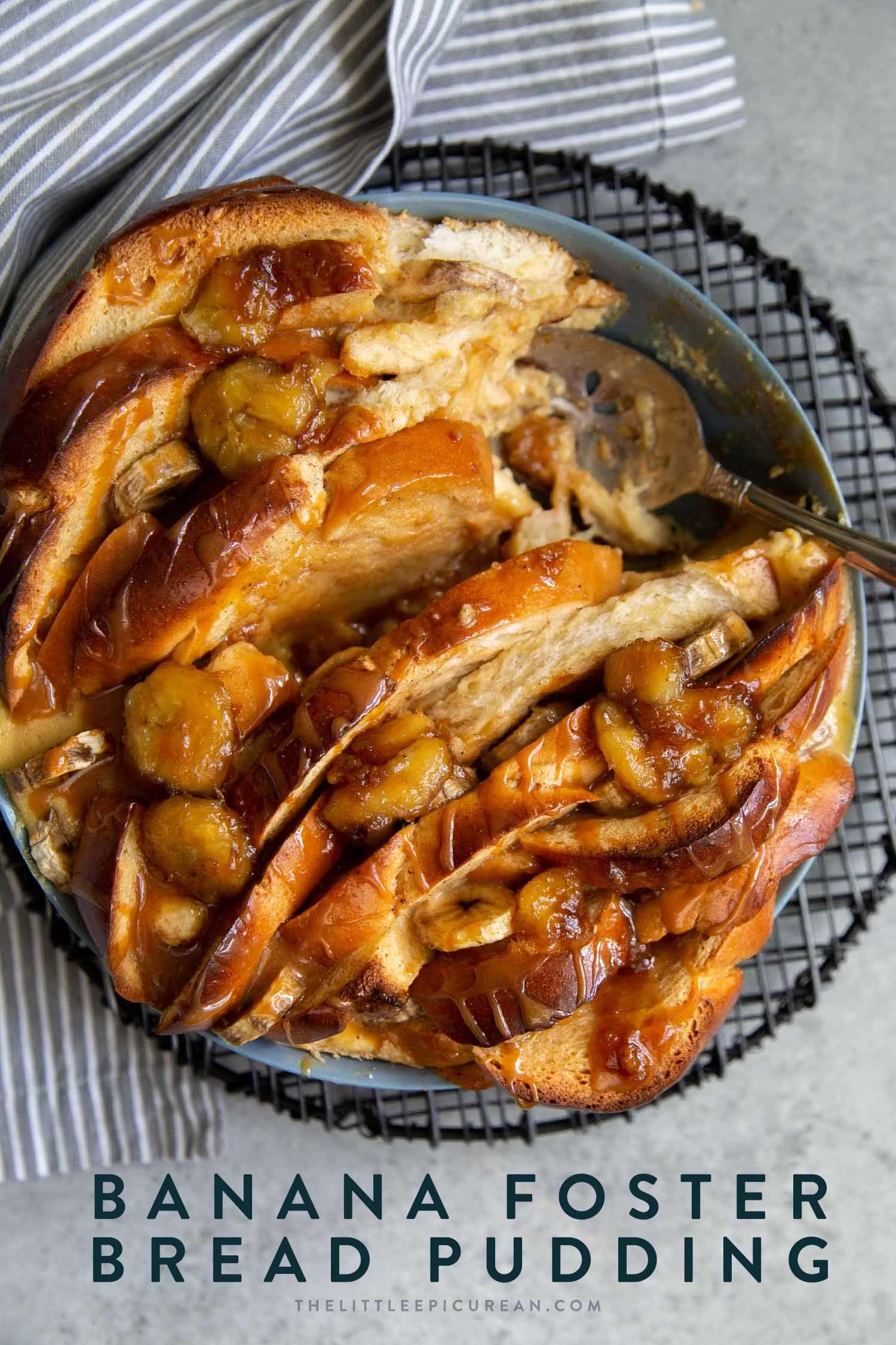 Banana Foster Bread Pudding. Sliced challah bread soaked in spiced custard mixture, baked until golden, and topped with brown sugar cooked bananas and caramel sauce. #breakfast #brunch #breadpudding #dessert #sweet