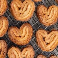 Cinnamon Sugar Palmier. These crispy mini cookies are made with puff pastry. They're super easy to assemble! #palmier #cookies #cinnamonsugar #easyrecipe #dessert