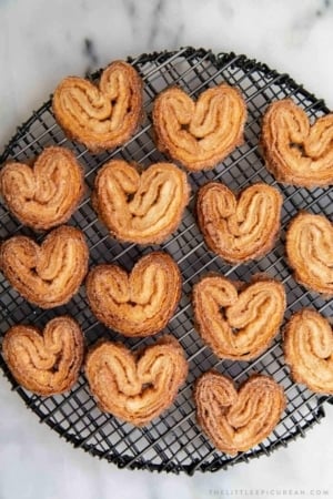 Cinnamon Sugar Palmier. These crispy mini cookies are made with puff pastry. They're super easy to assemble! #palmier #cookies #cinnamonsugar #easyrecipe #dessert