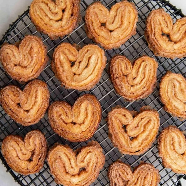 Cinnamon Sugar Palmier. These crispy mini cookies are made with puff pastry. They're super easy to assemble! #palmier #cookies #cinnamonsugar #easyrecipe #dessert