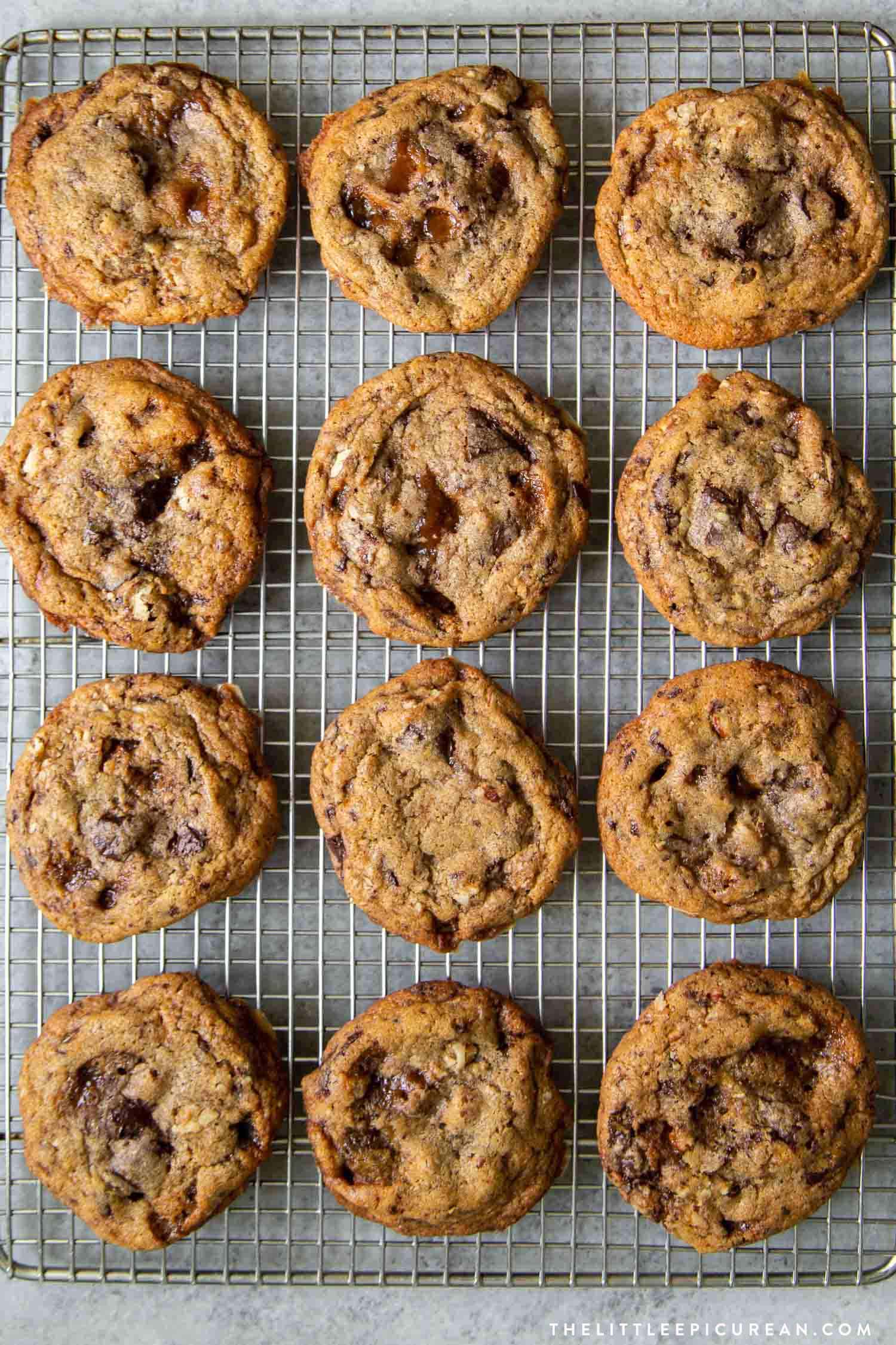 Pecan Toffee Chocolate Chunk Cookies. These soft and chewy cookies are loaded with flavor. They remain chewy even days after baking! #cookies #holidaycookies #cookieexchange #recipe #chocolate #toffee #dessert