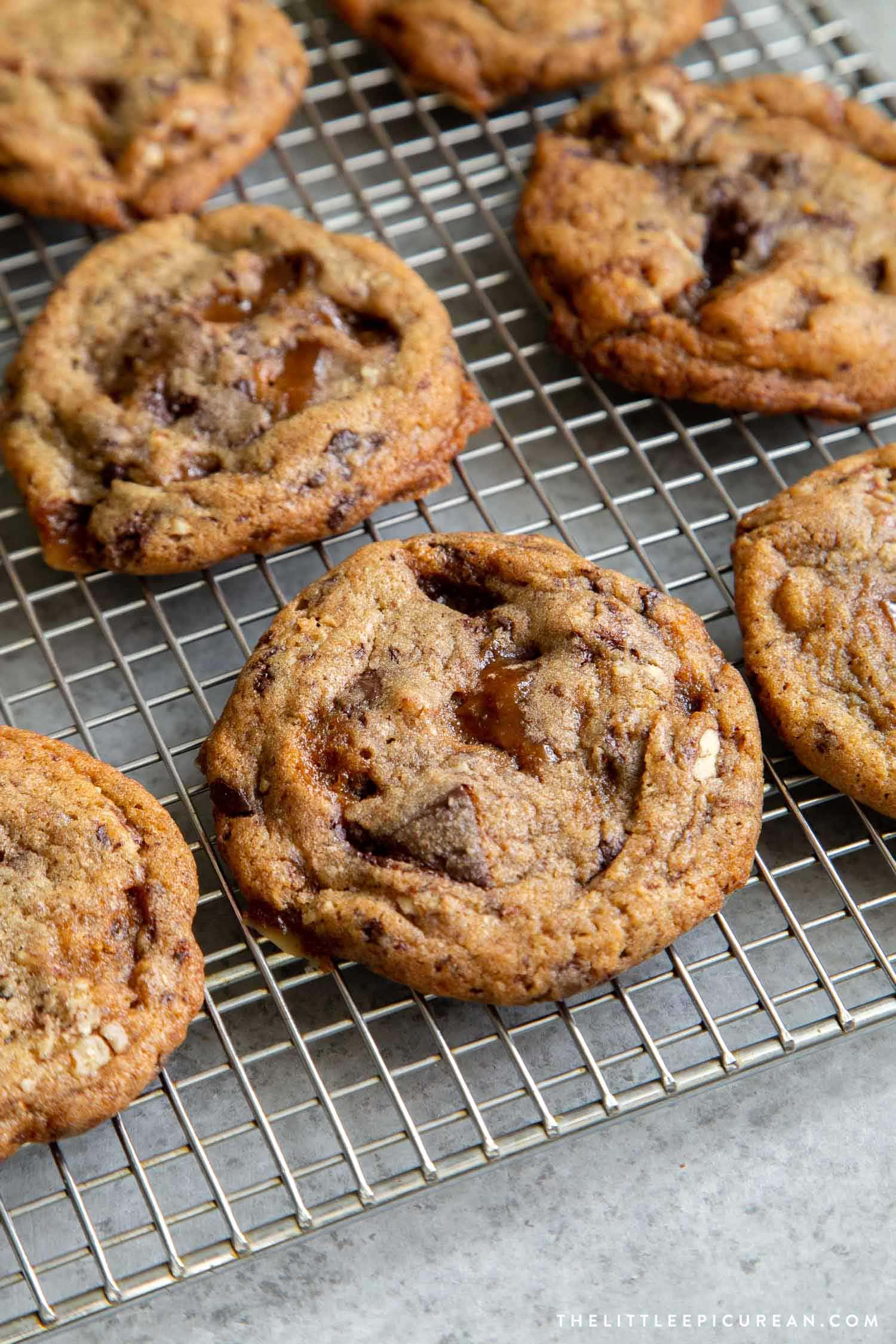 Pecan Toffee Chocolate Chunk Cookies. These soft and chewy cookies are loaded with flavor. They remain chewy even days after baking! #cookies #holidaycookies #cookieexchange #recipe #chocolate #toffee #dessert