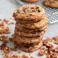Pecan Toffee Chocolate Chunk Cookies. These soft and chewy cookies are loaded with flavor. They remain chewy even days after baking! #cookies #holidaycookies #cookieexchange #recipe #chocolate #toffee #dessert