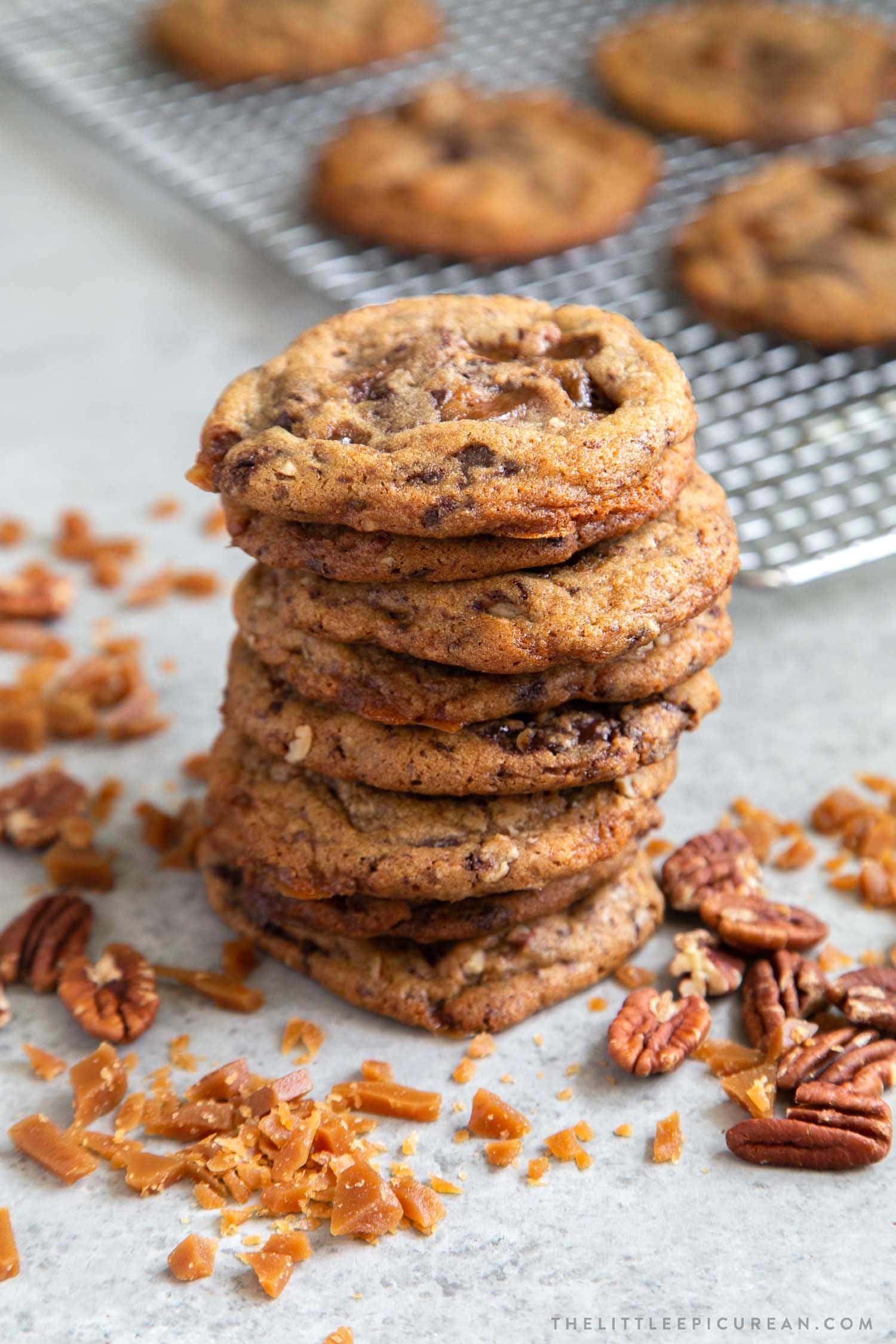 Pecan Toffee Chocolate Chunk Cookies. These soft and chewy cookies are loaded with flavor. They remain chewy even days after baking! #cookies #holidaycookies #cookieexchange #recipe #chocolate #toffee #dessert