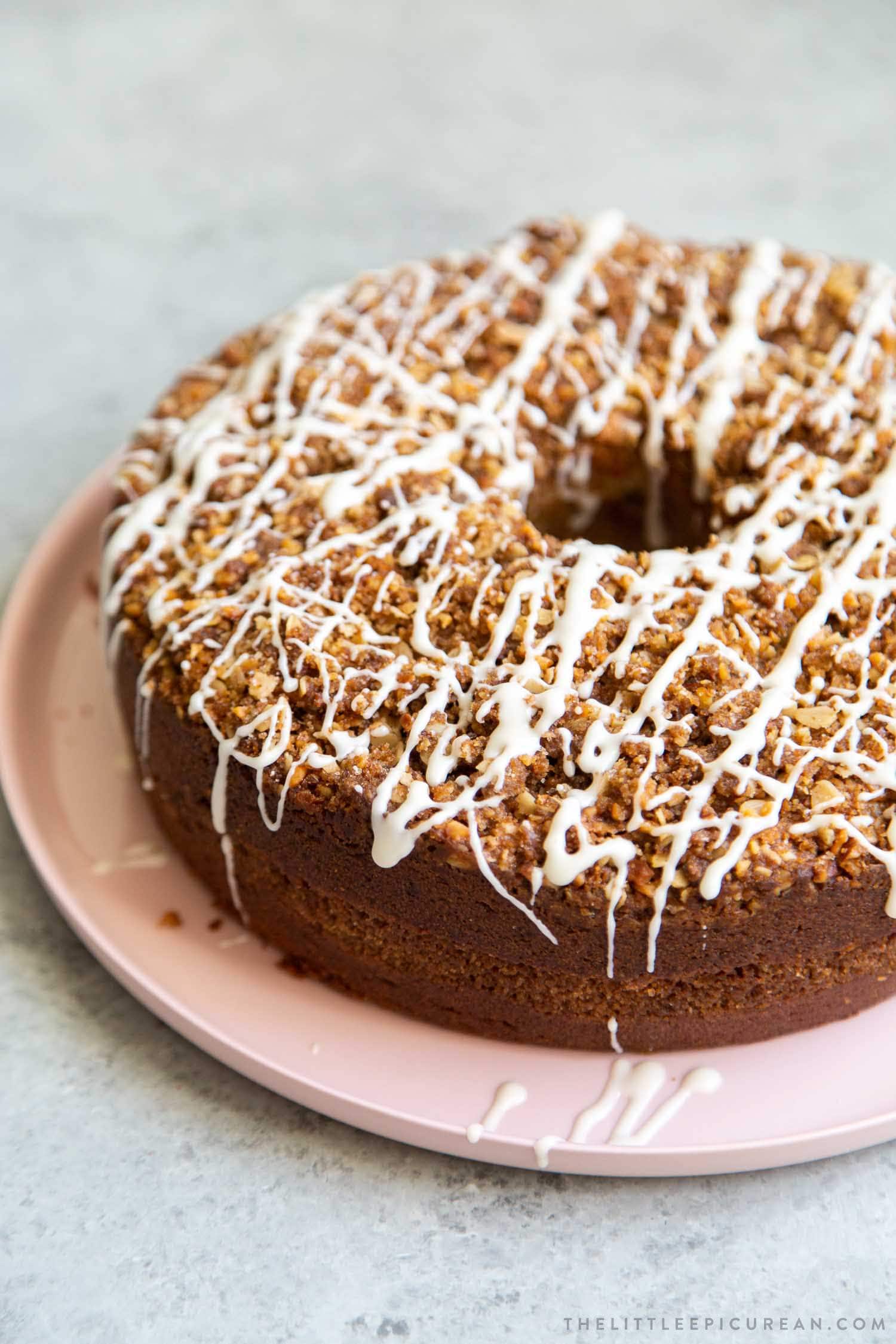 Banana Crumb Cake. Moist banana cake with cinnamon sugar filling topped with walnut oat crumble topping.