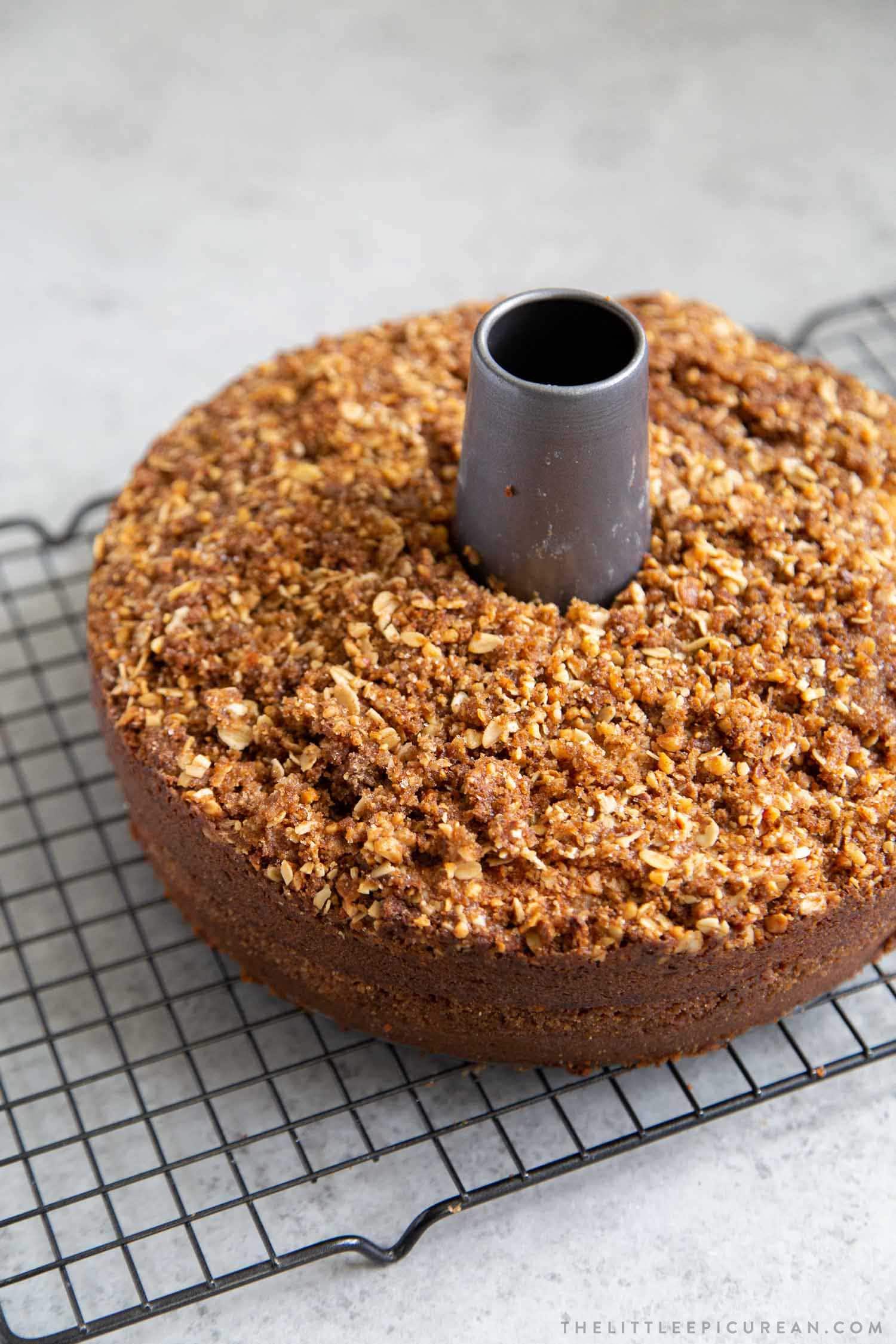 Banana Crumb Cake. Moist banana cake with cinnamon sugar filling topped with walnut oat crumble topping.