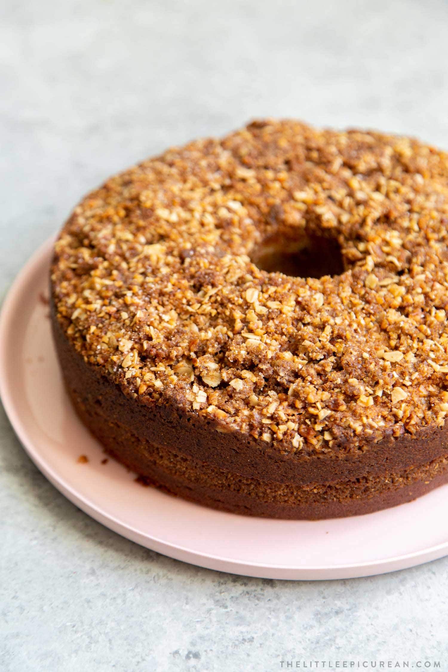 Banana Crumb Cake. Moist banana cake with cinnamon sugar filling topped with walnut oat crumble topping.