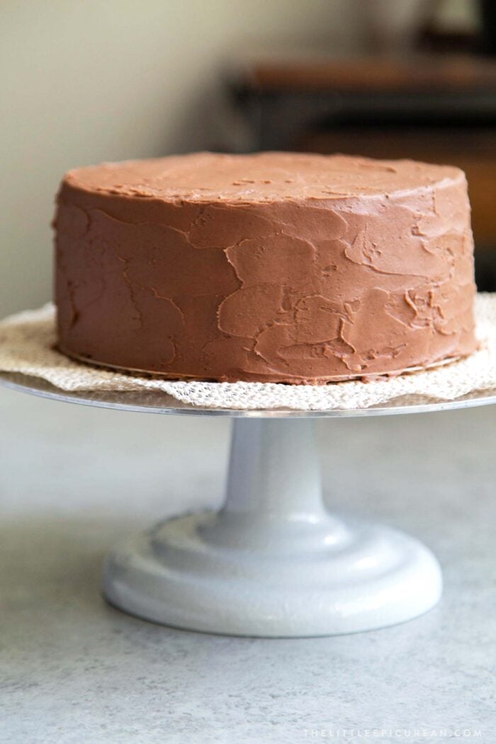 Two layer 8-inch Classic Chocolate Cake with Simple Chocolate American Buttercream.