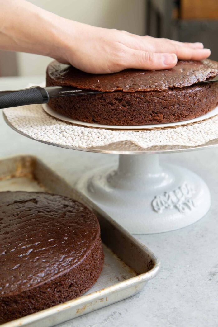 This classic chocolate cake recipe makes two 8-inch cake layers or three 6-inch cake layers. Use a serrated cake knife to level cake layers if necessary.