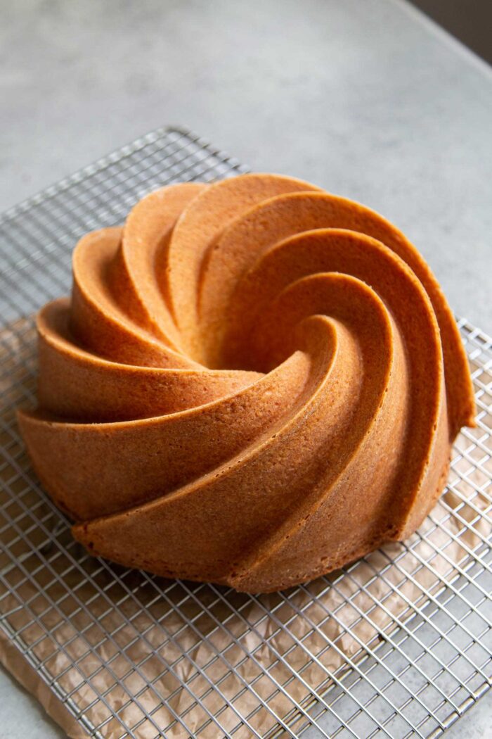 Orange Blossom Bundt Cake cooling on wire rack.