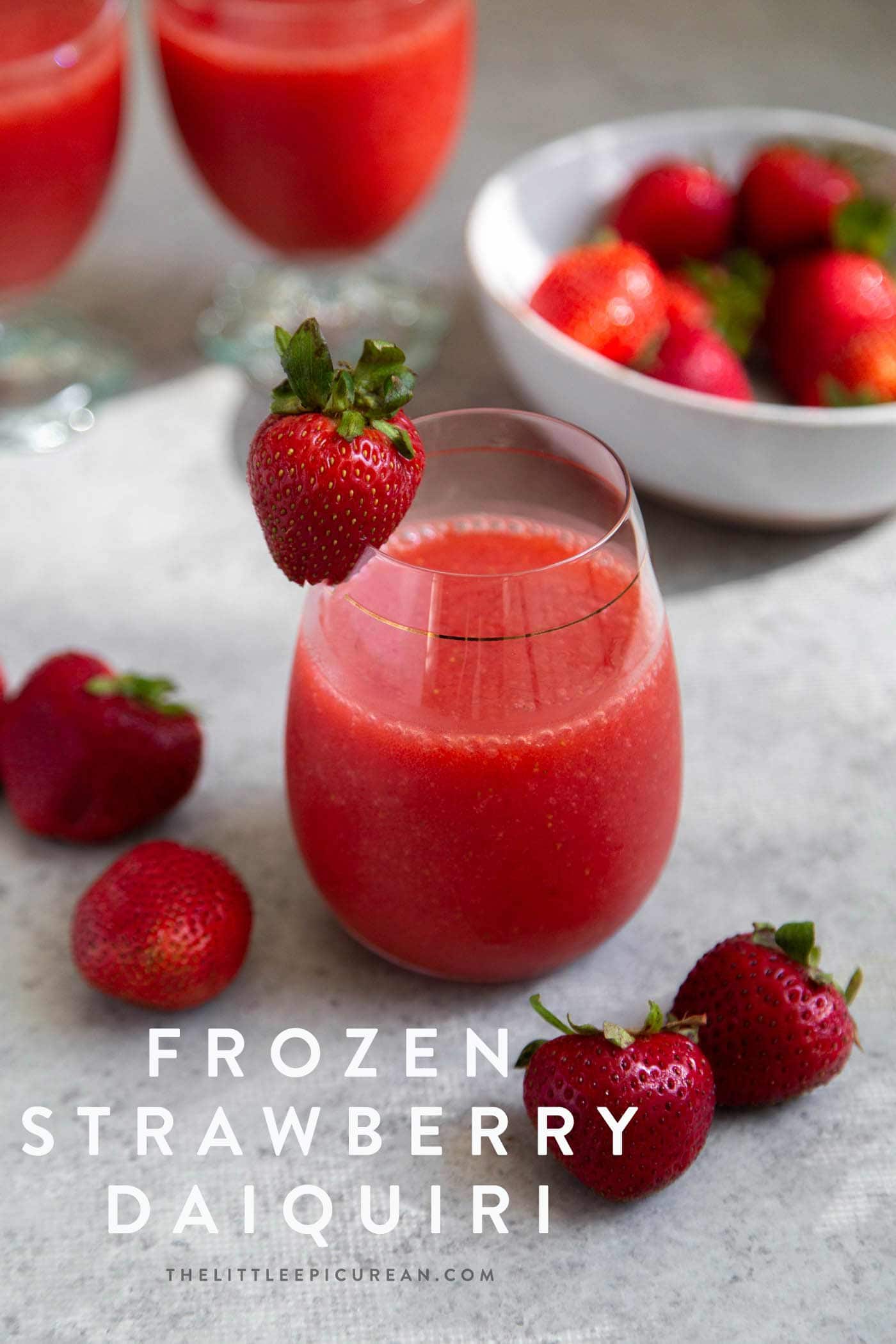 Frozen strawberry daiquiri made with frozen strawberries, light rum, lime juice, and simple syrup