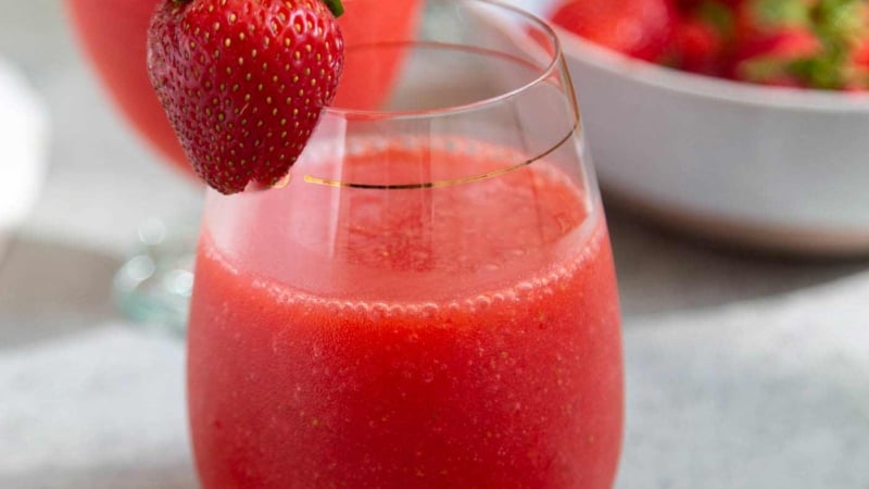 Frozen strawberry daiquiri made with frozen strawberries, light rum, lime juice, and simple syrup