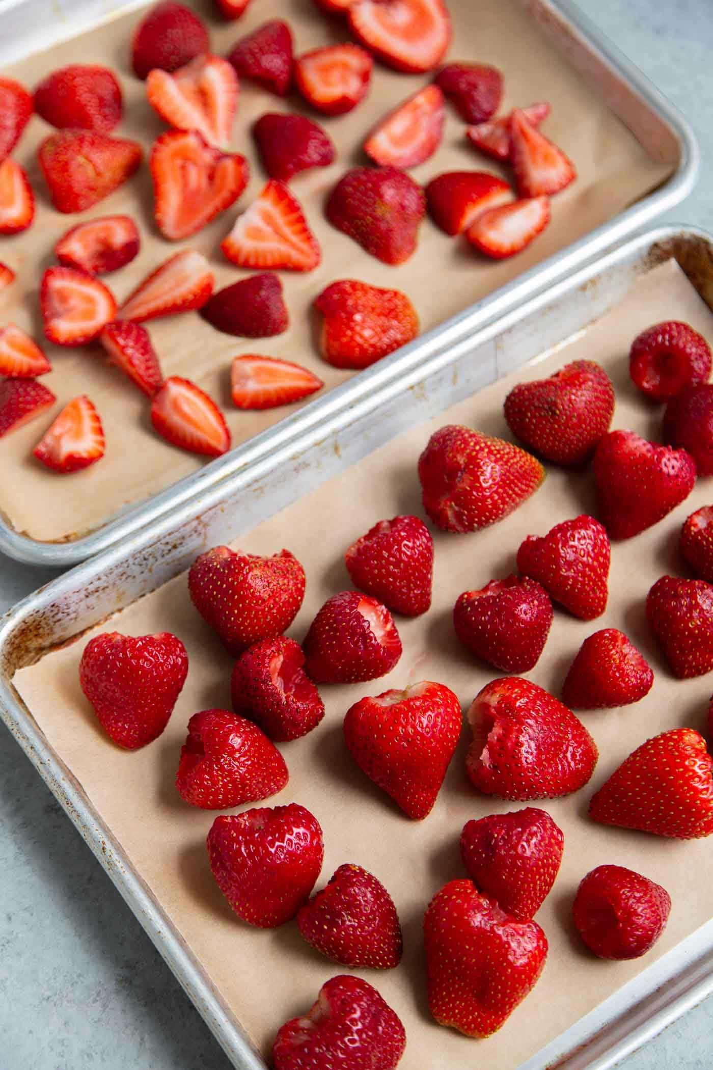 Place hulled strawberries on sheet tray