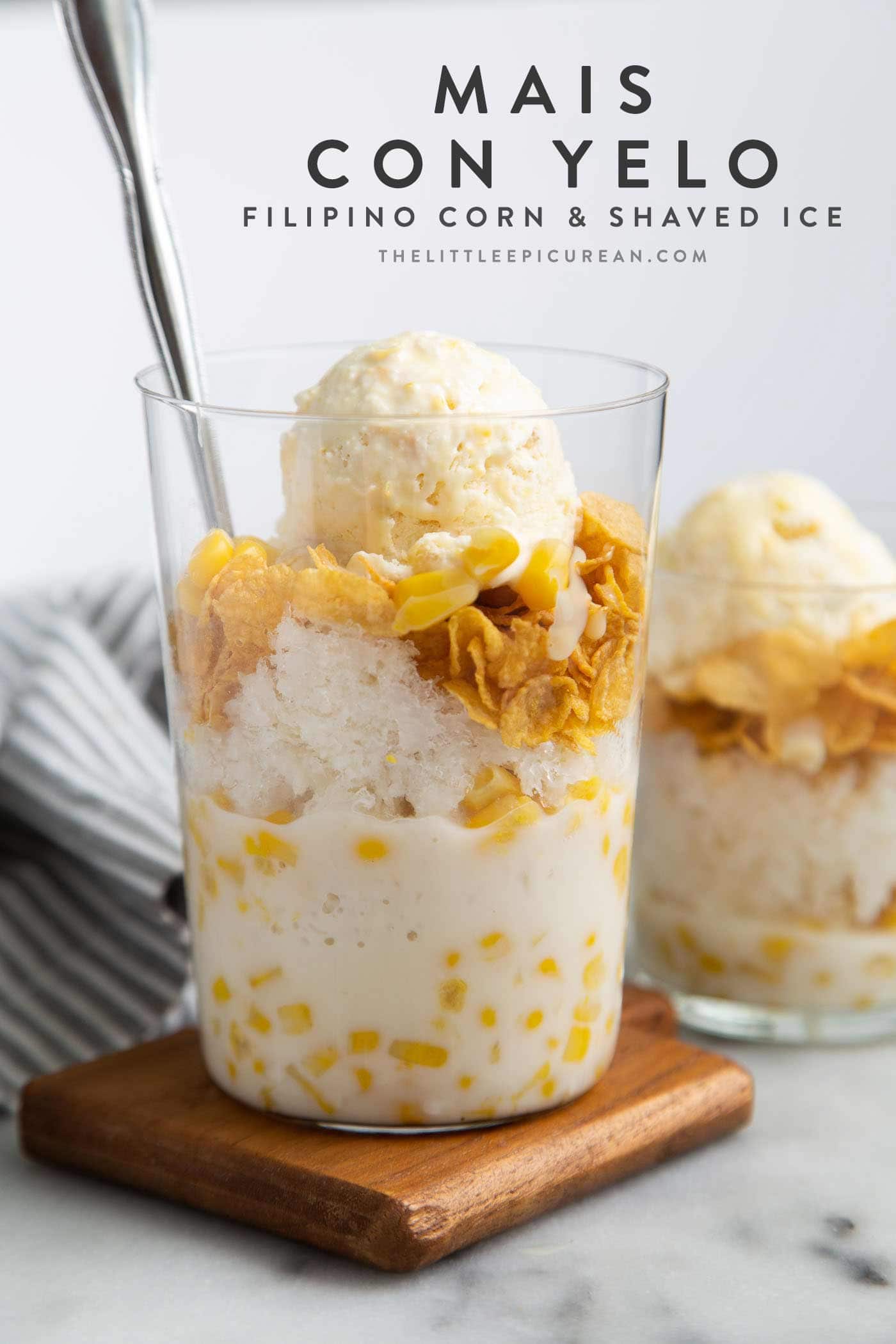 Mais con yelo. Filipino layered dessert consisting of corn, shaved ice, sweetened condensed milk, and ice cream