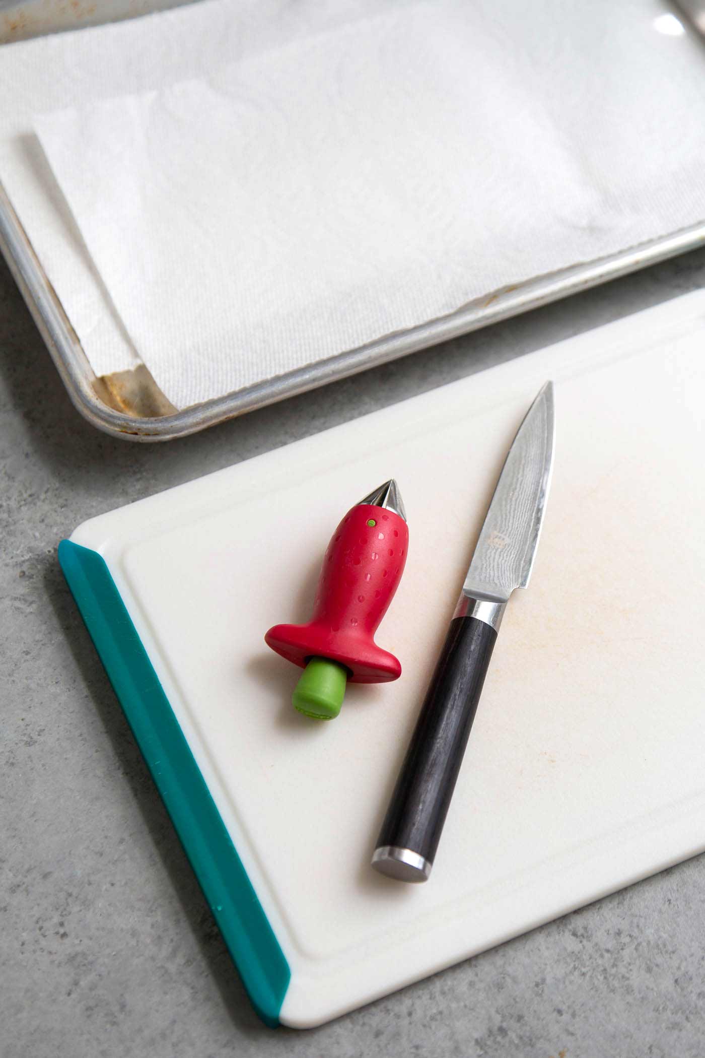 Tools for preparing fresh strawberries to be frozen