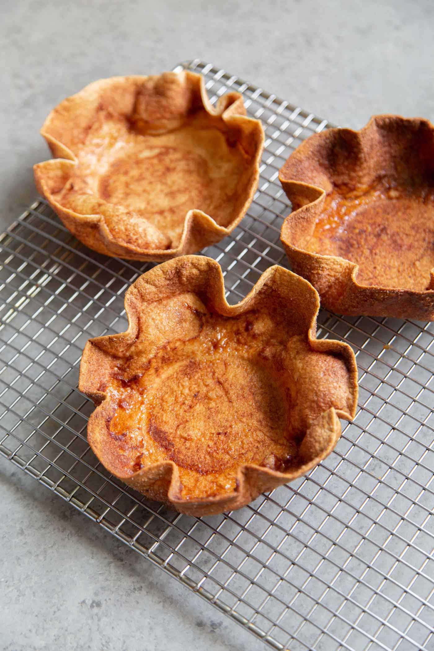 Cinnamon Sugar Tortilla Bowl on wire rack. 