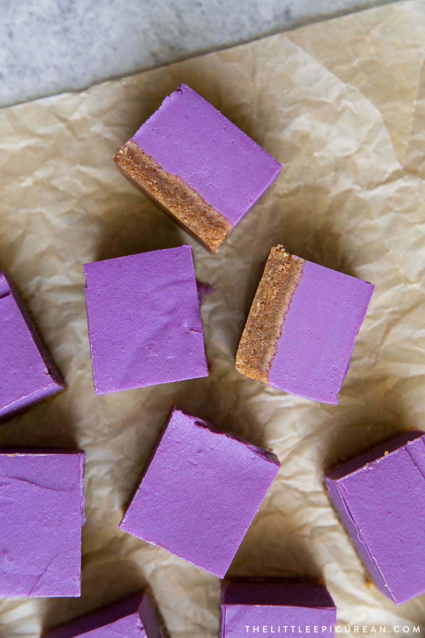 Purple sweet potato pie bars with almond butter crust. This all-natural dye-free vegan treat is great any season.