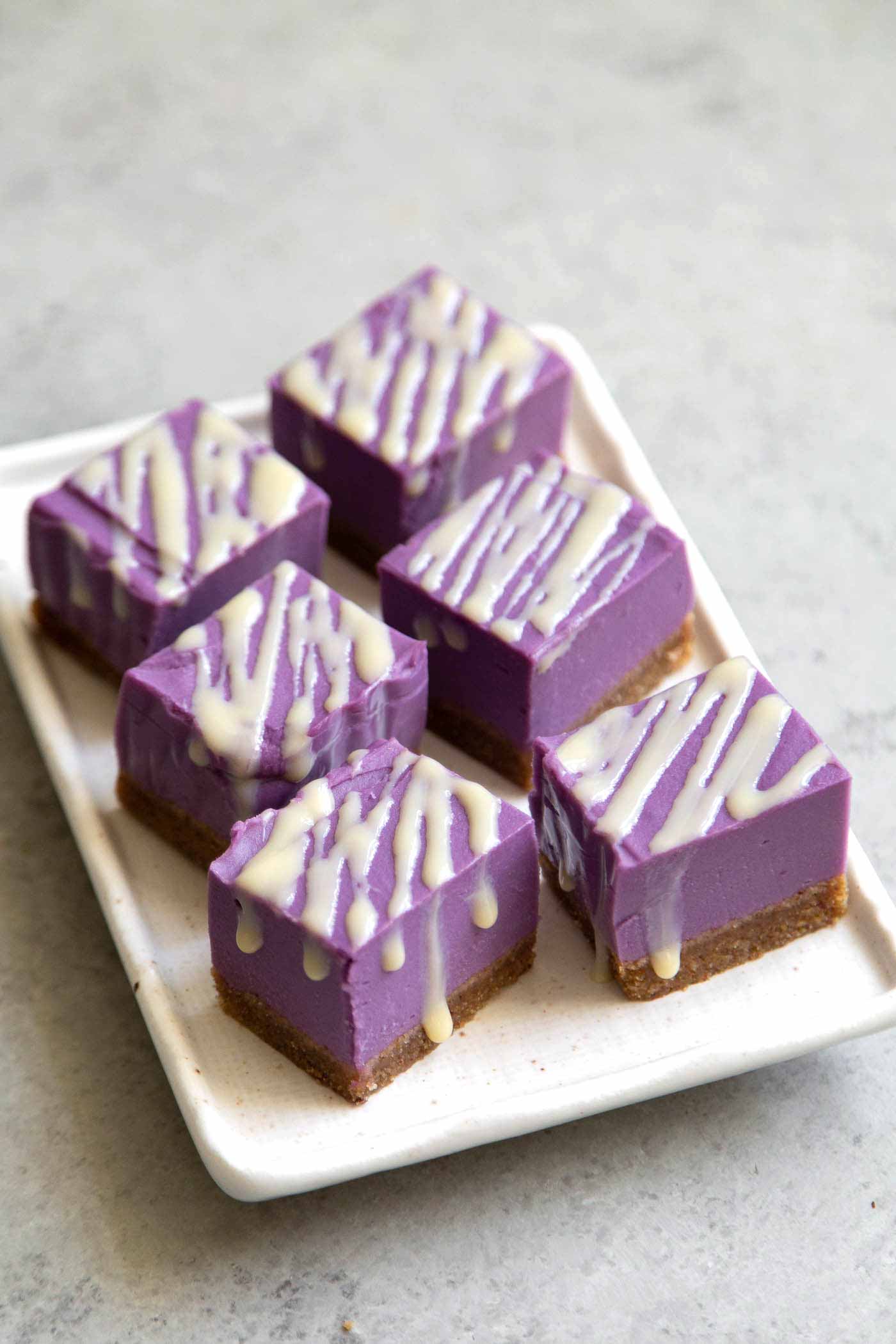 Purple Sweet Potato Pie Bars with sweetened milk drizzle