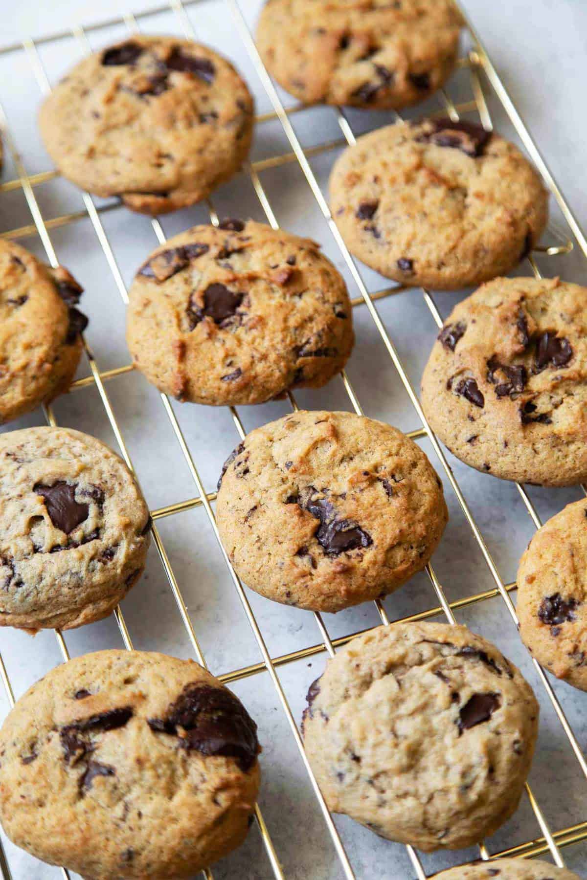 banana chocolate chip cookies on wire cooling rack.