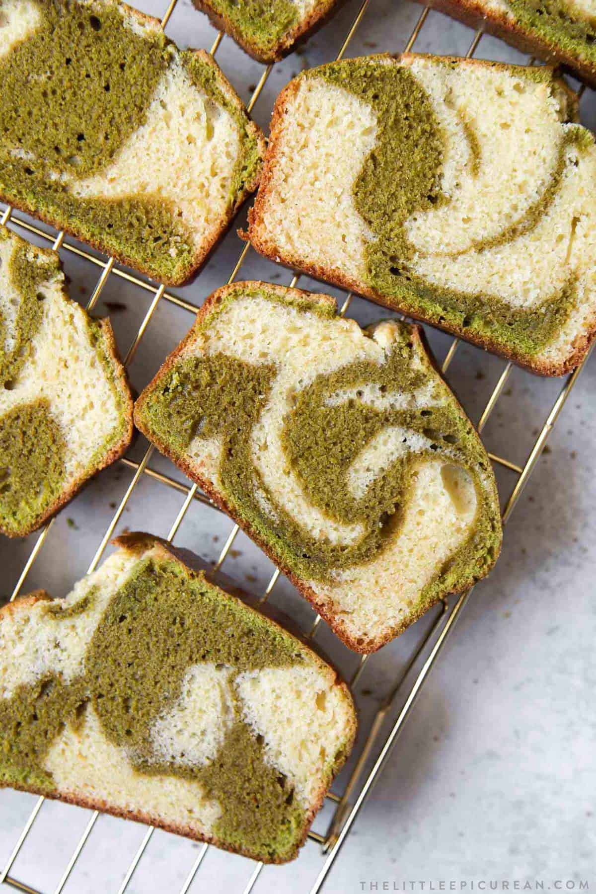 Matcha Marble Pound Cake slices on wire rack. 