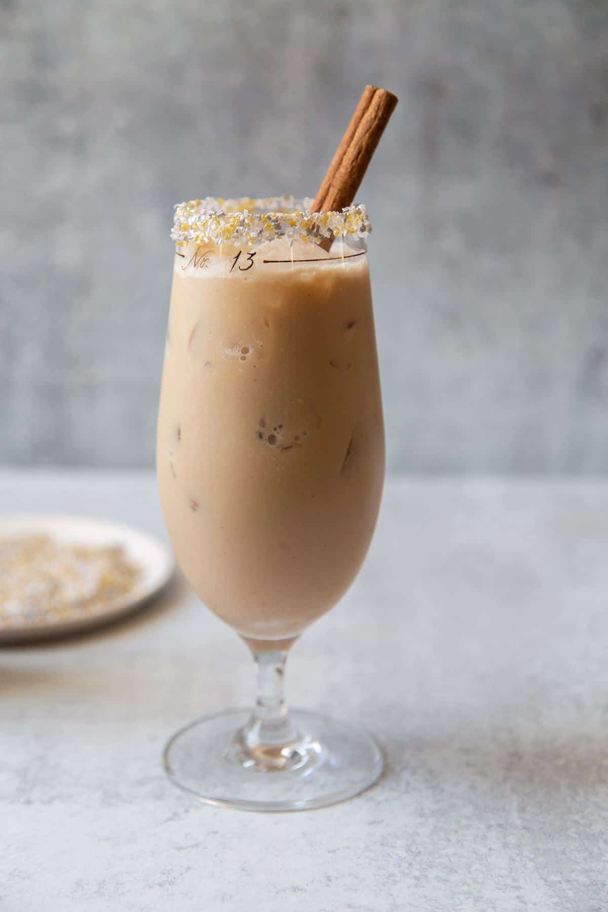 Coconut Coffee Cocktail garnished with cinnamon stick