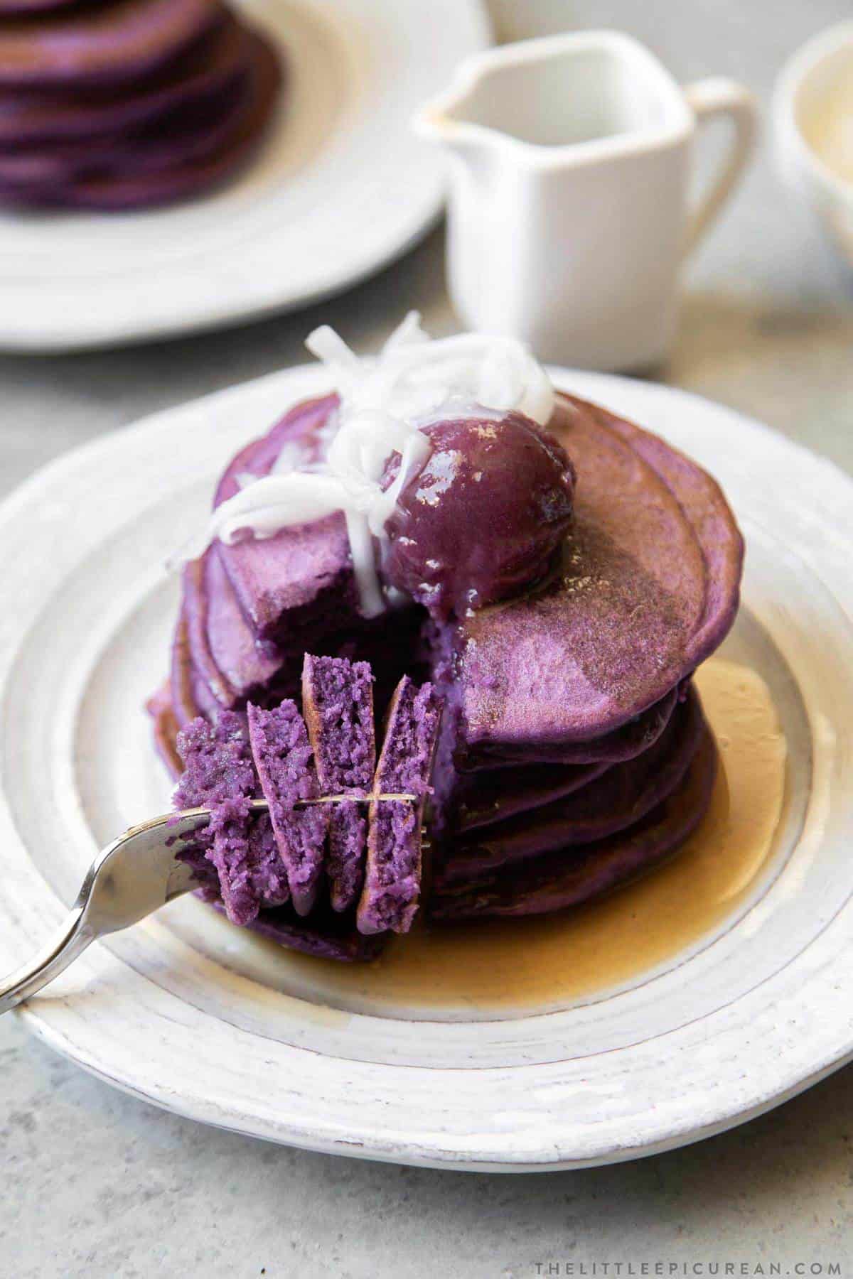ube pancakes with coconut macapuno string and maple syrup