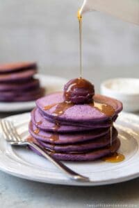 ube pancakes with ube halaya and maple syrup