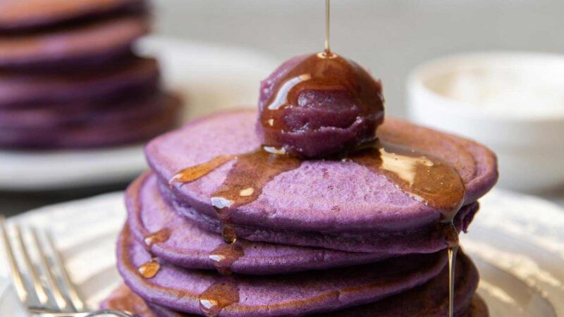 ube pancakes with ube halaya and maple syrup