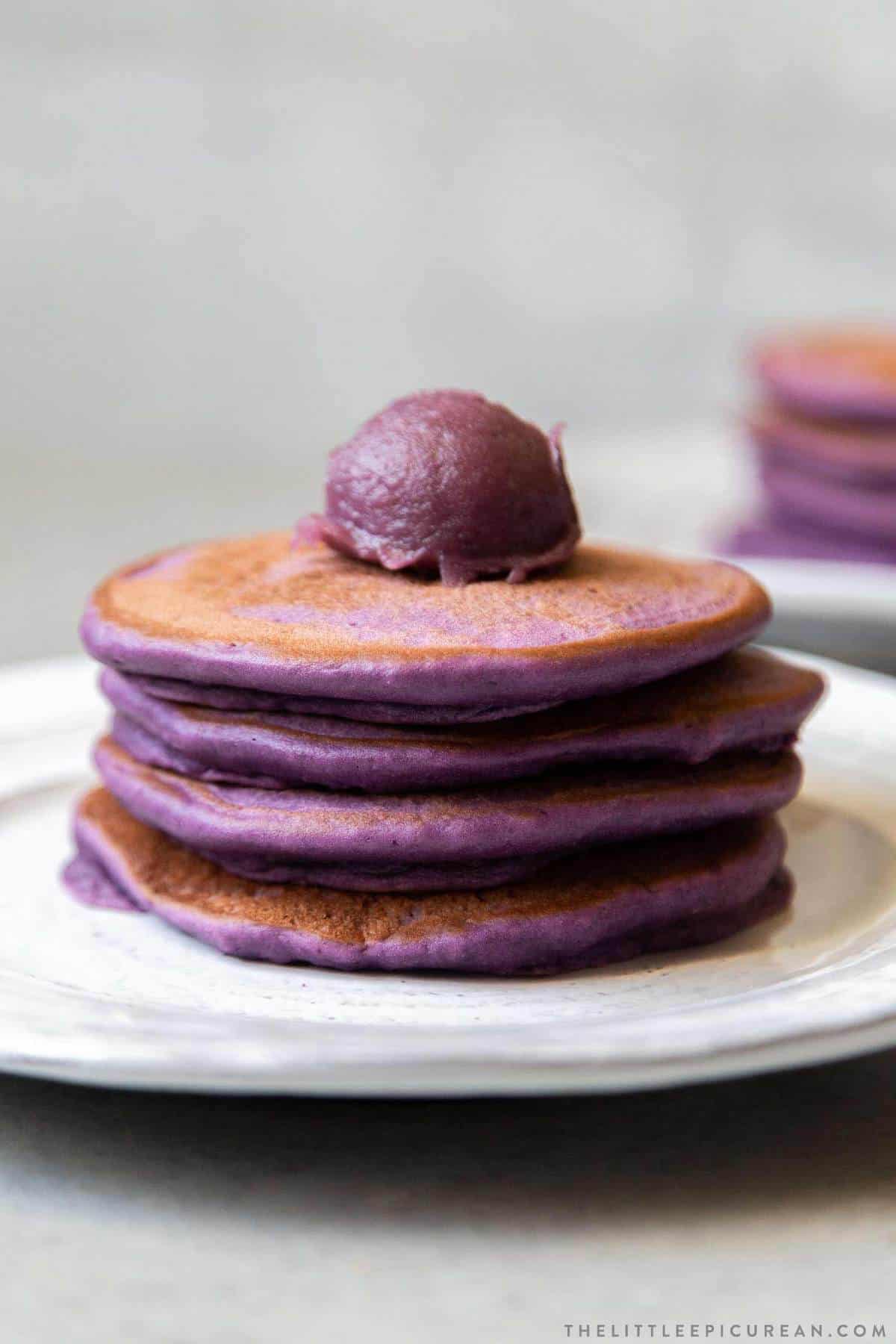 ube pancakes topped with ube halaya