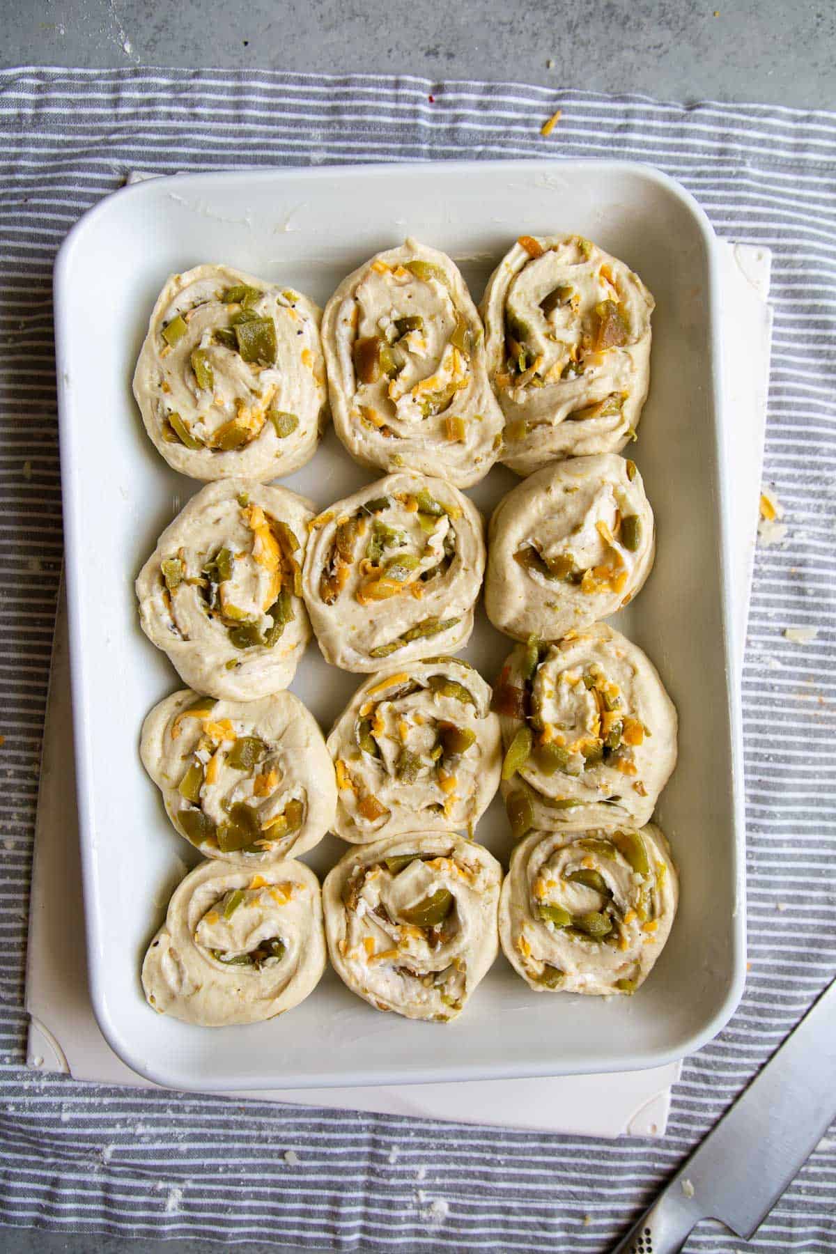 roasted green chile cheddar rolls before baking.