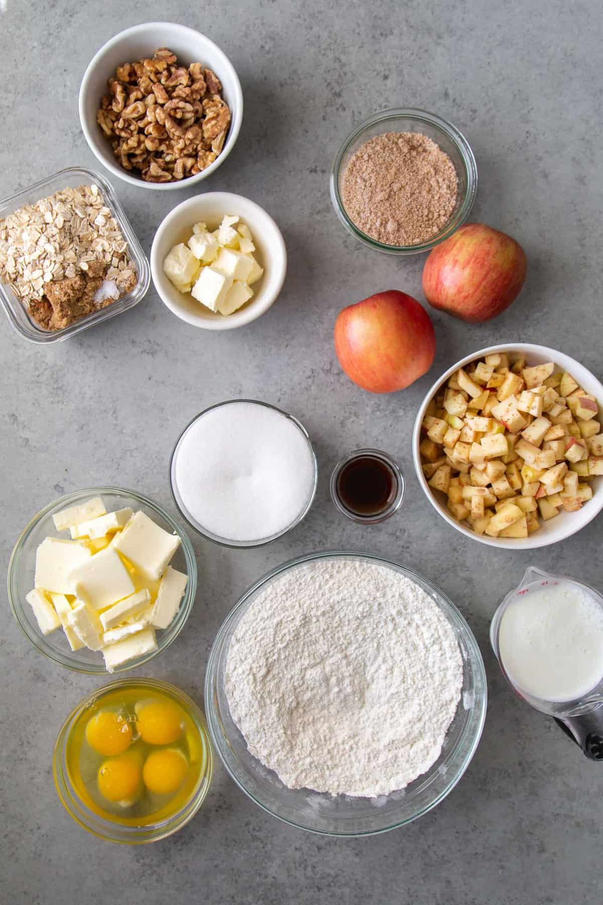 overhead shot of ingredients needed for vanilla cake, cinnamon sugar filling, and crumble topping.