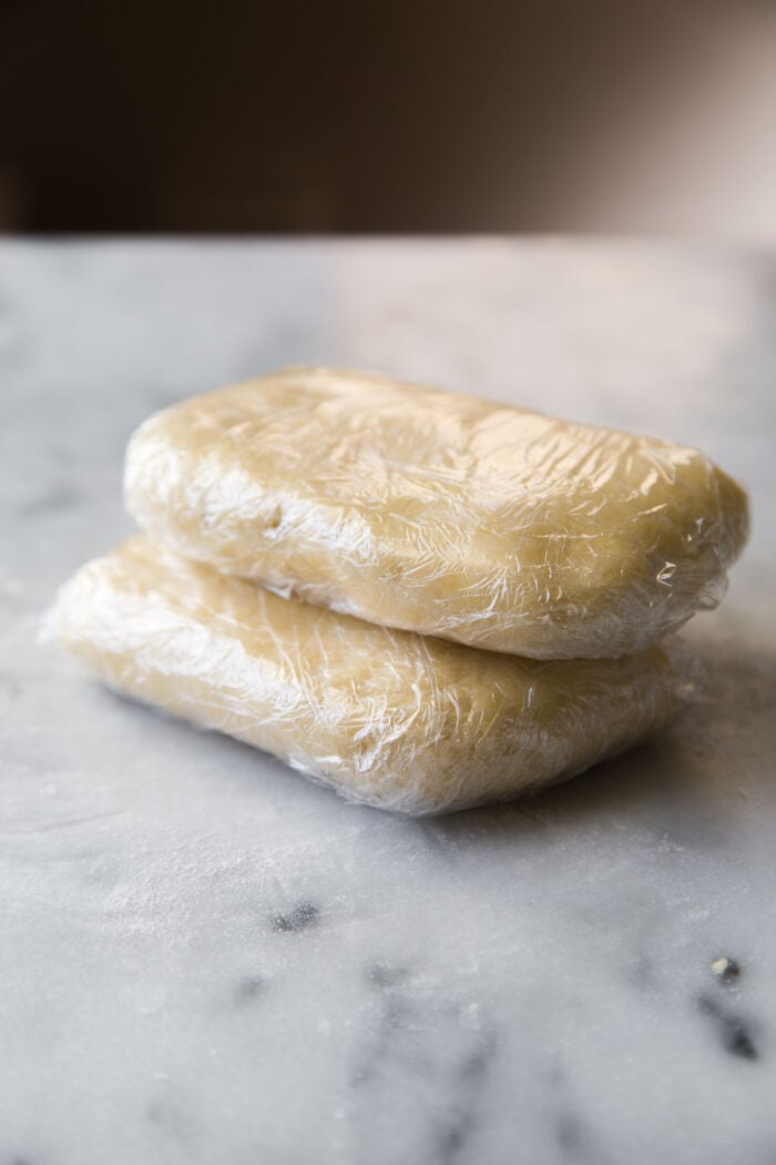 double crust pie dough plastic wrapped.