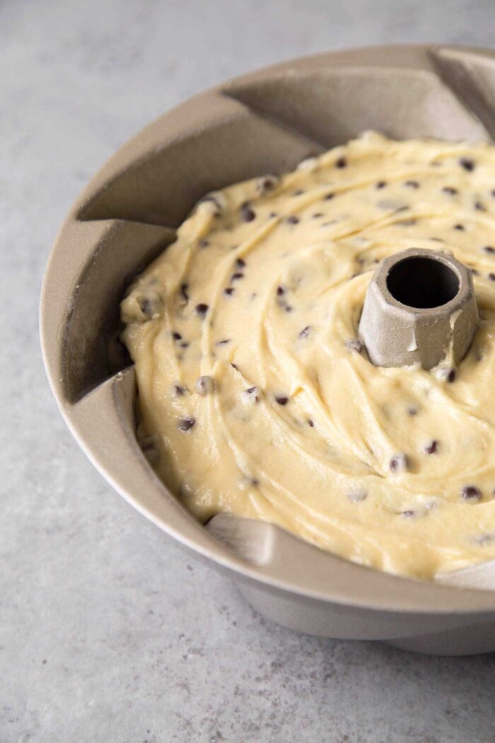 prepared bundt cake pan with batter before baking.