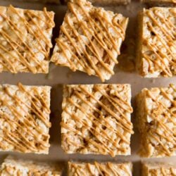 Biscoff Rice Krispies Treats Squares drizzled with melted cookie butter.