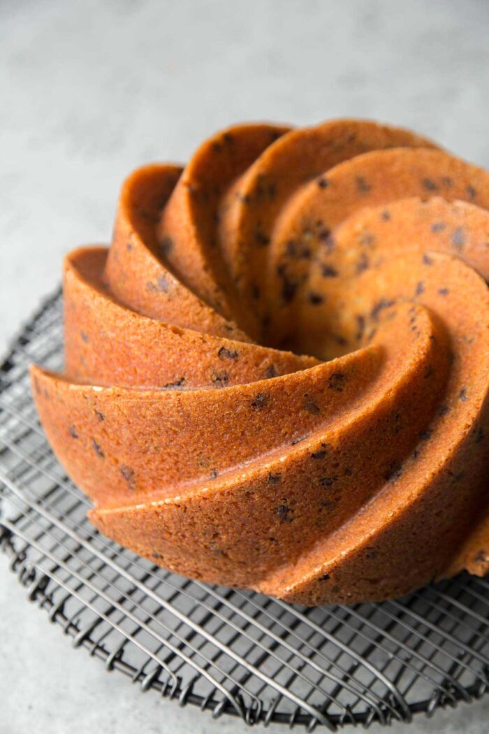 chocolate chip bundt cake on black wire rack.