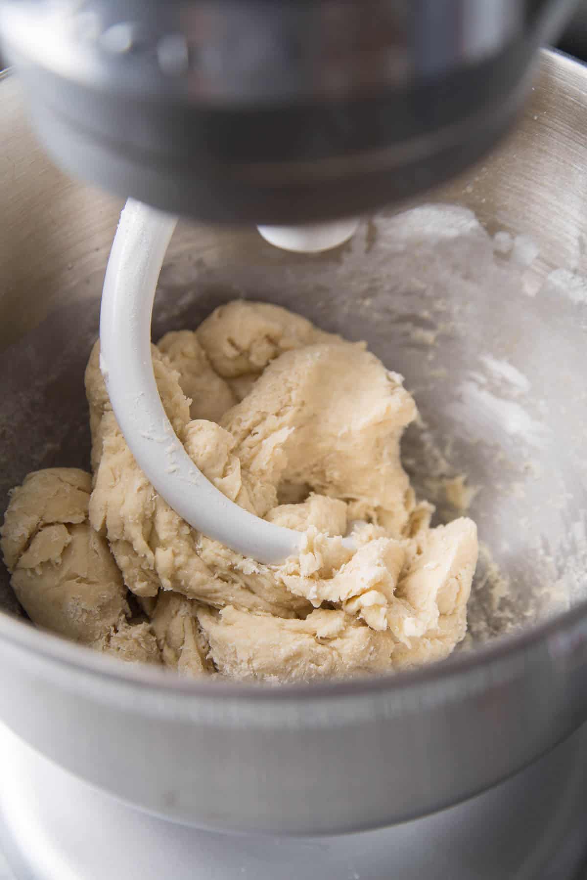 dough coming together in stand mixer.
