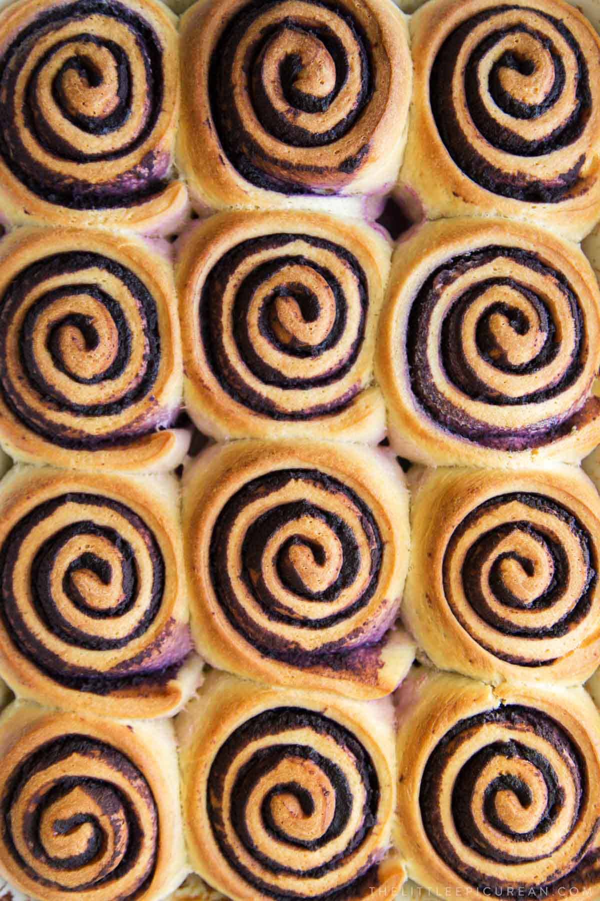 close up of ube bread rolls featuring ube halaya filling.