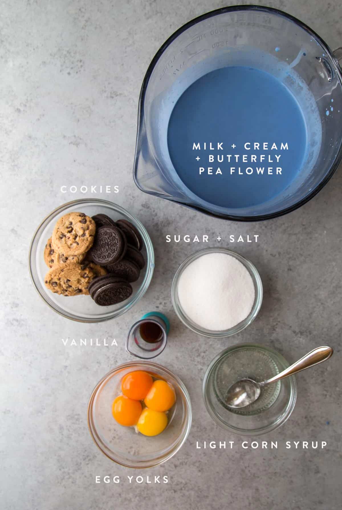 overhead shot of cookie monster ice cream ingredients including butterfly pea flower.