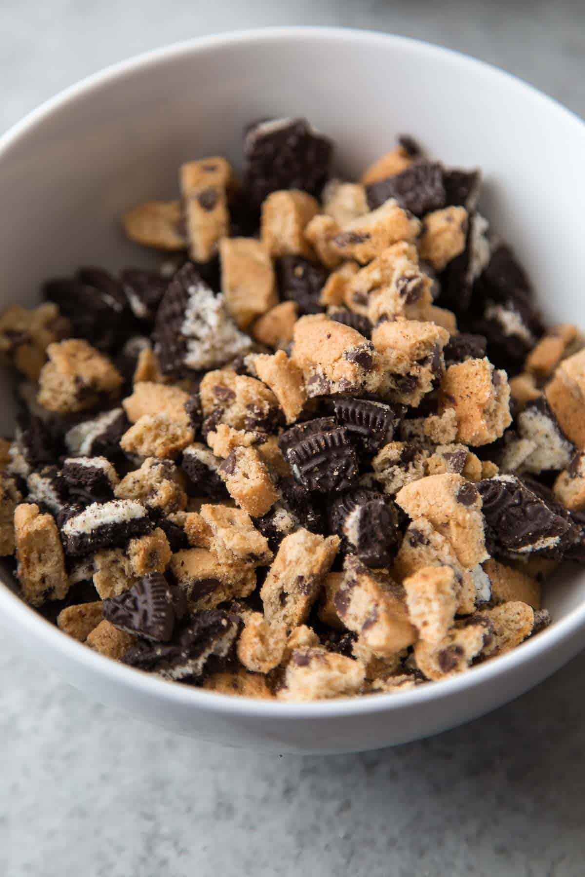 bowl of chopped up chips ahoy cookies and oreo cookies.