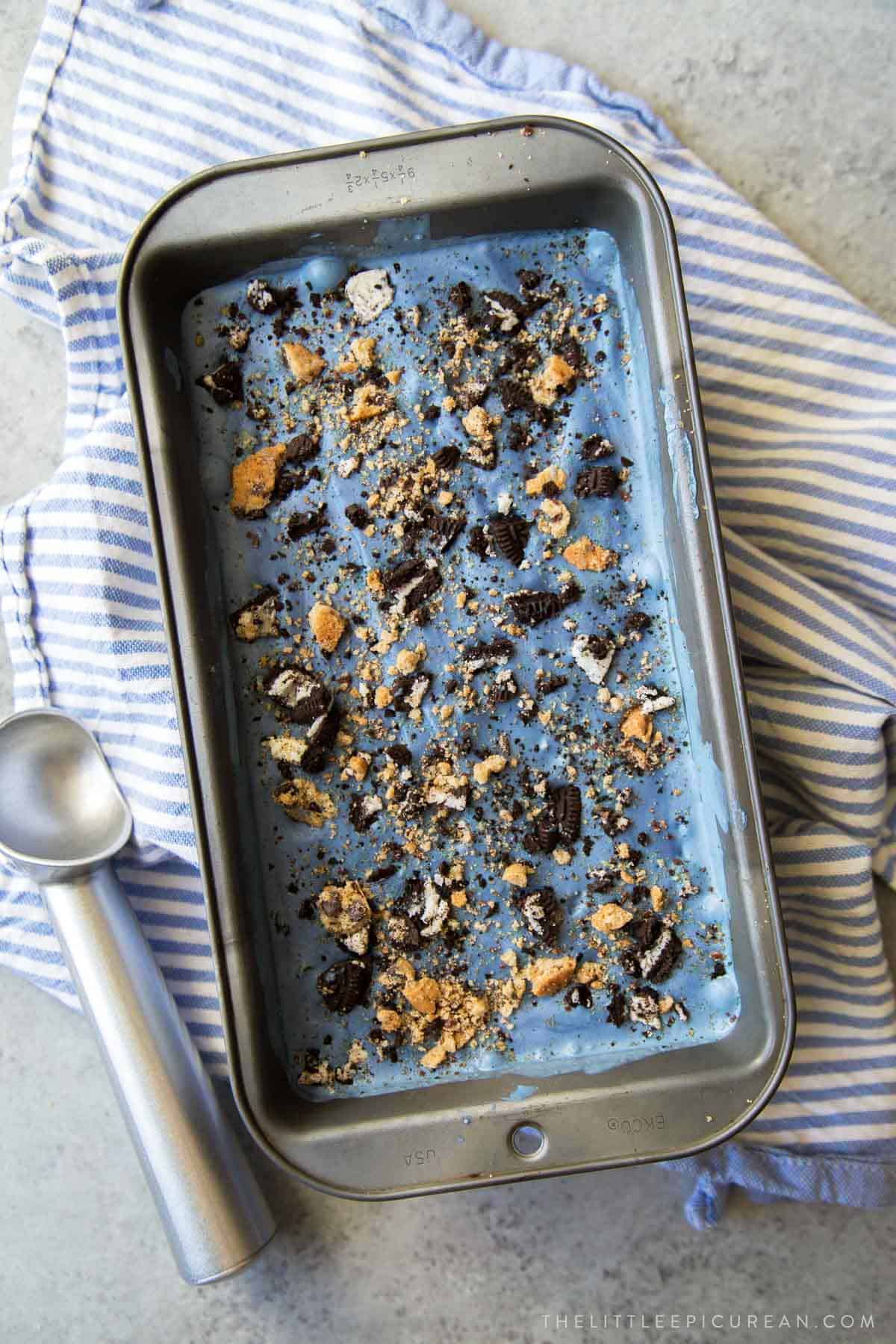 naturally blue colored cookie monster ice cream studded with cookies and oreos.