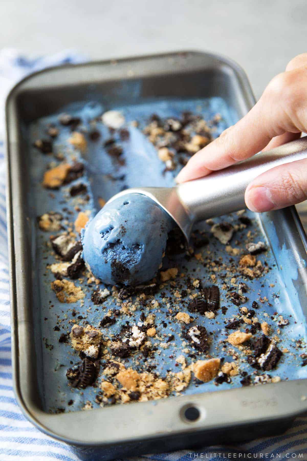 scooping naturally blue cookie monster ice cream.