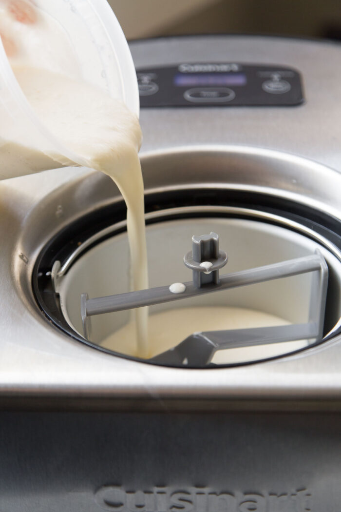 pour cheesecake ice cream batter into ice cream machine.