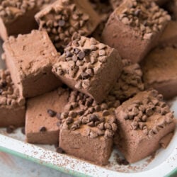 chocolate chip chocolate marshmallows in a white enamel serving tray.