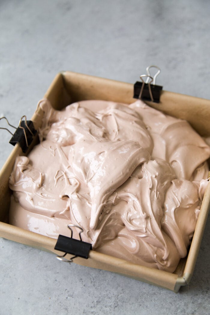 spread chocolate meringue mixture into prepared baking pan.